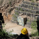 Journalists film the fourth tunnel of Punggye-ri nuclear test ground is seen before it is blown up during the dismantlement process in Punggye-ri, North Hamgyong Province, North Korea May 24, 2018. Picture taken May 24, 2018